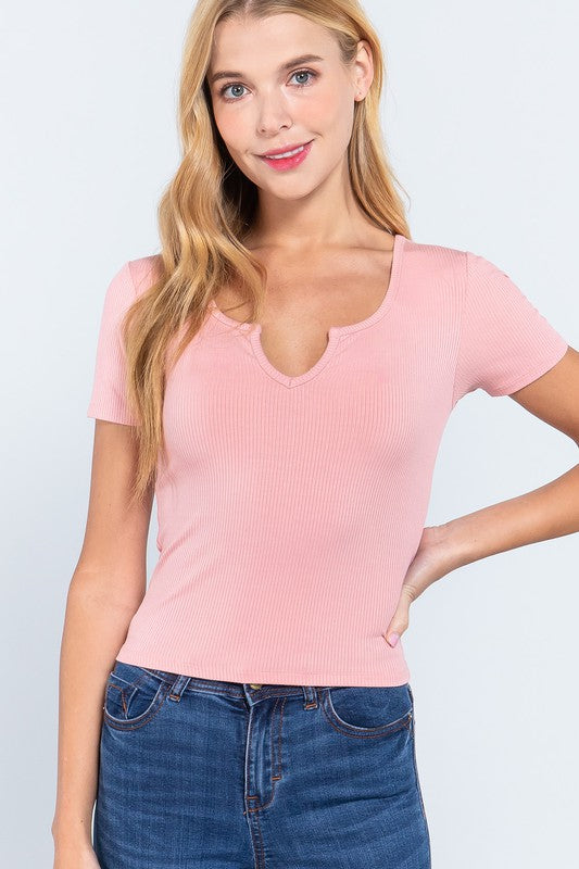 rib knit short sleeve top has a notched detail
